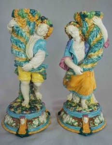 Boy and girl cornucopia vases