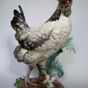 Cockerel with chick figure by Paul Comolera