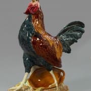 Monumental rooster figure