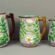 George Jones wild rose pitchers in graduated sizes