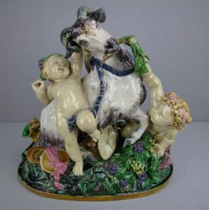 Minton goat and putti figure