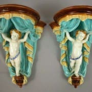 Putti wall brackets