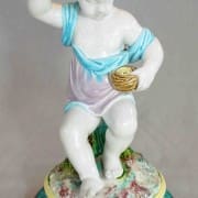 Putto with nest candlestick