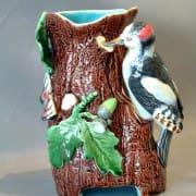 Woodpecker and butterfly vase